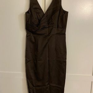 Excellent condition. Brown satin dress above knee.